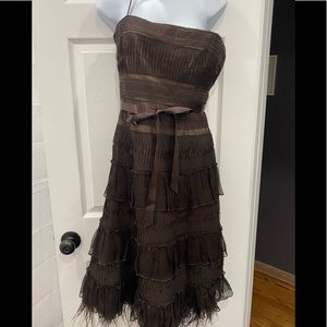 BcbgMaxAzria brown dress with feather details at bottom.